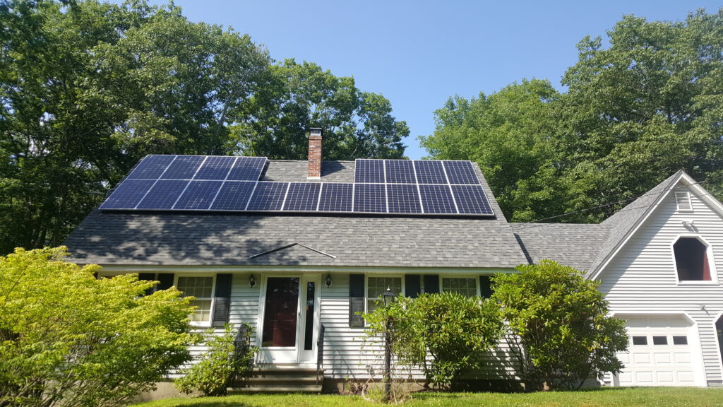 Photo of house with solar panels on roof